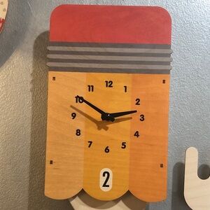 Modern Moose (Now "Popclox") Pencil Pendulum Clock